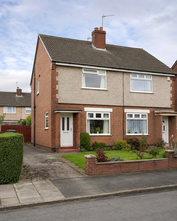 Affordable 1950s British semi-detached house in an established residential street