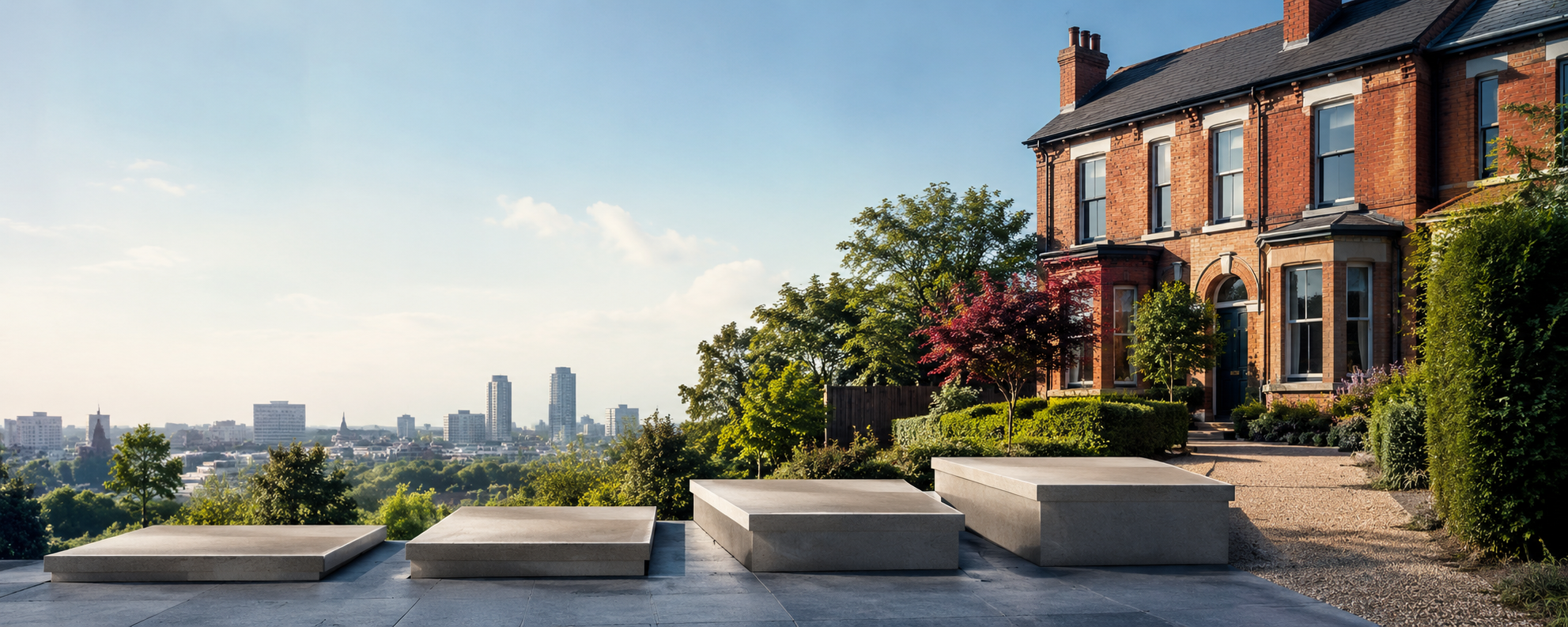 Victorian red-brick terrace above a city skyline